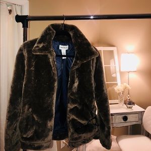 Fux Fur zip up jacket. fully lined with navy silk